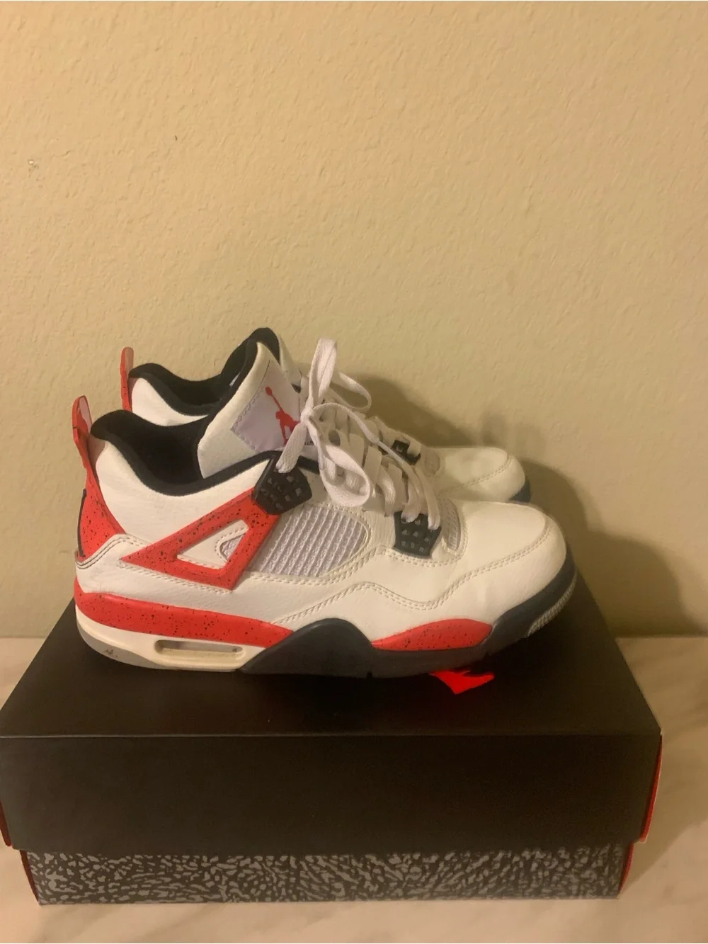 Jordan Retro 4 Sneakers in White/Red/Black